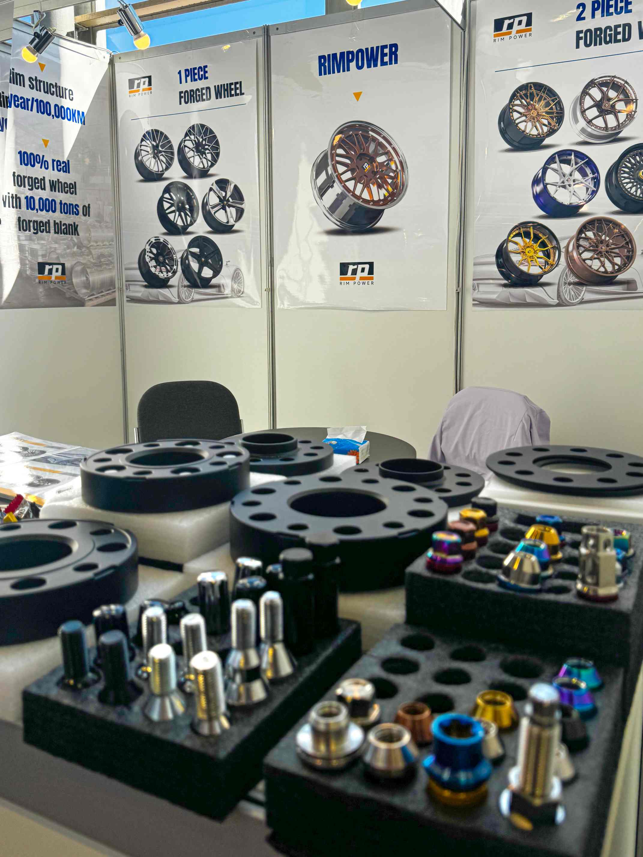 Forged wheel lug nuts and wheel spacers display